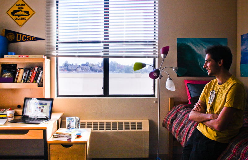 A student in their residence hall room