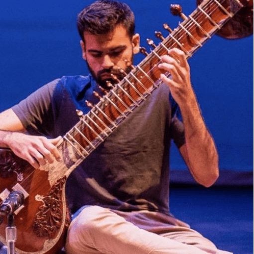 Man playing a sitar